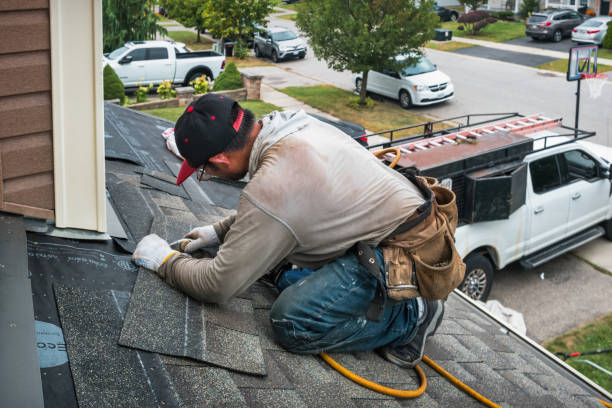 Professional Roofing technician working in Riva, MD